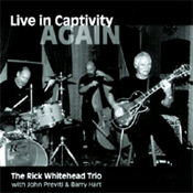 Live in Captivity/Again